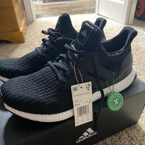 Black and white mens Adidas Ultra boosts